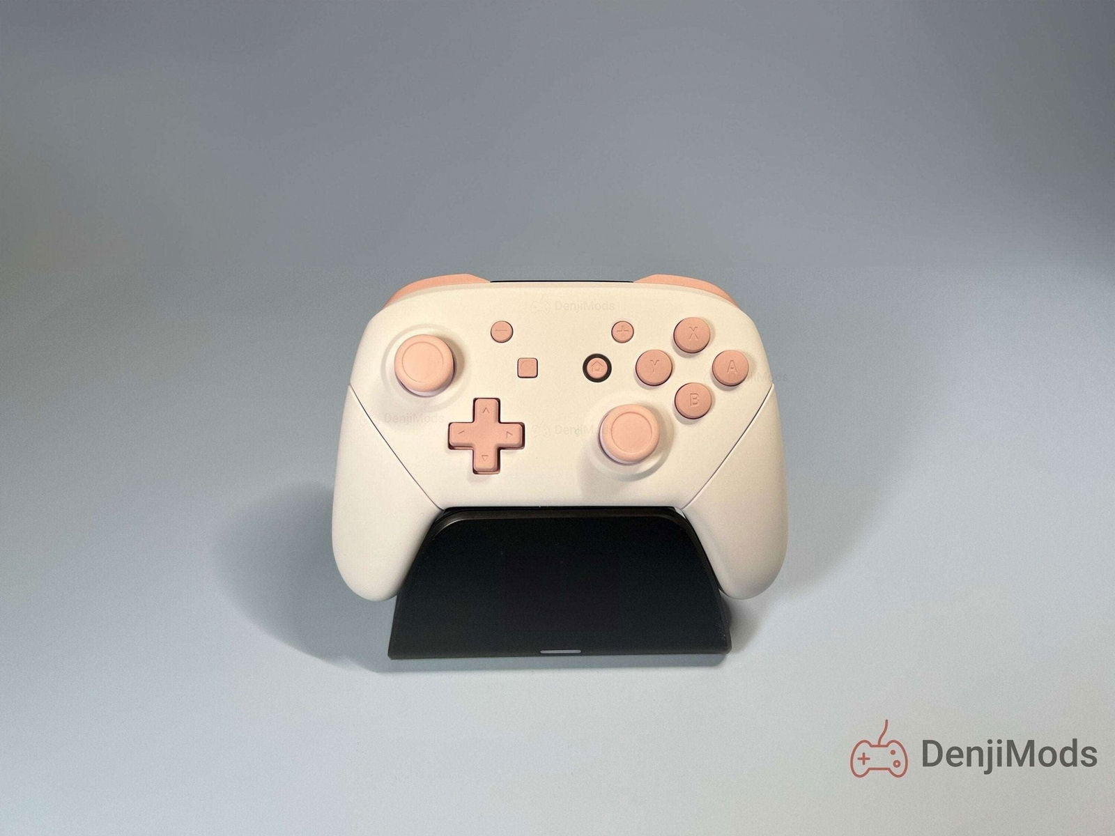 Custom Matte White Nintendo Switch Pro Controller on display stand