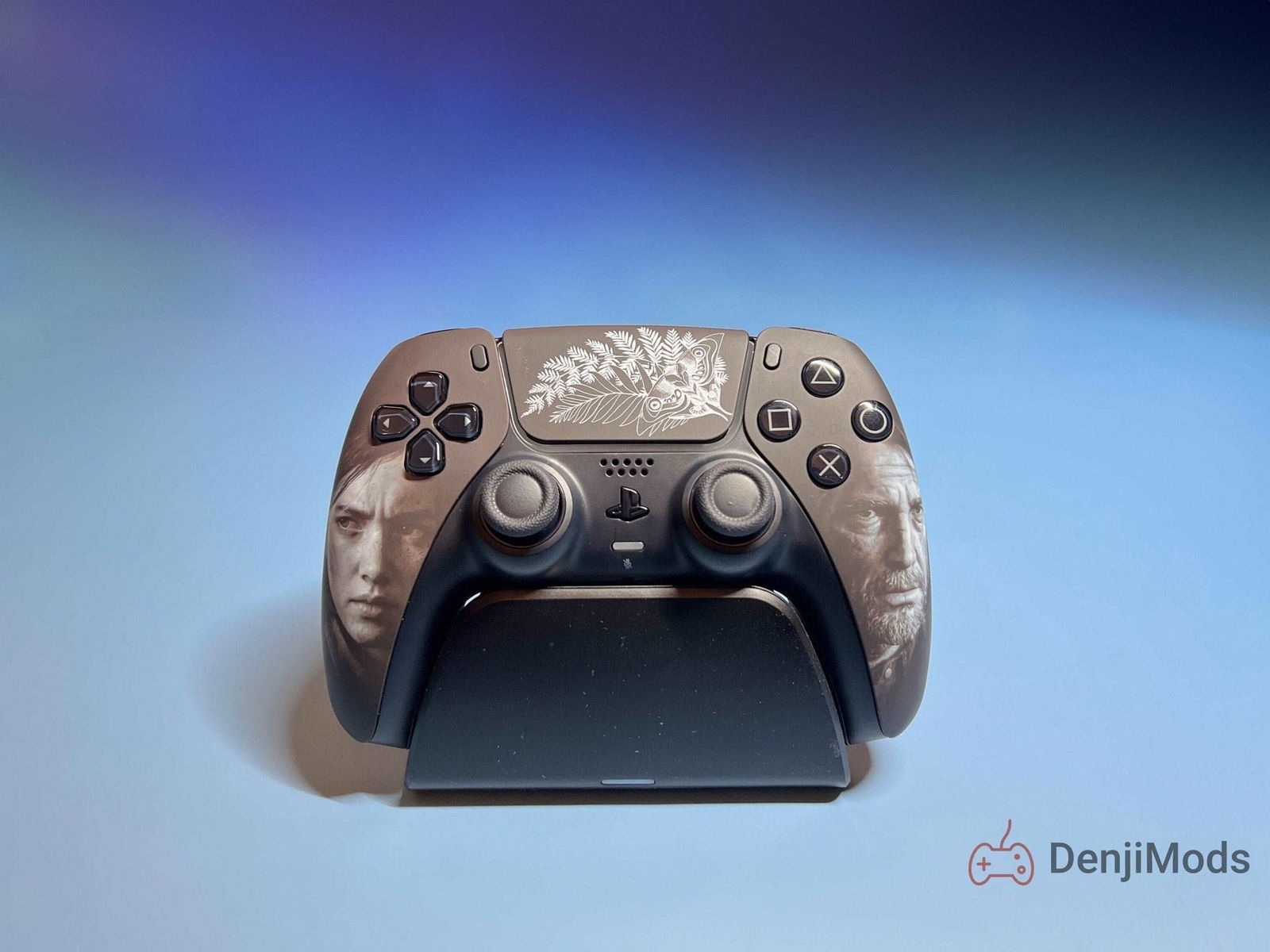Custom The Last of Us Playstation 5 Dualsense Controller showcasing Ellie, Joel, and Ellie's tattoo.