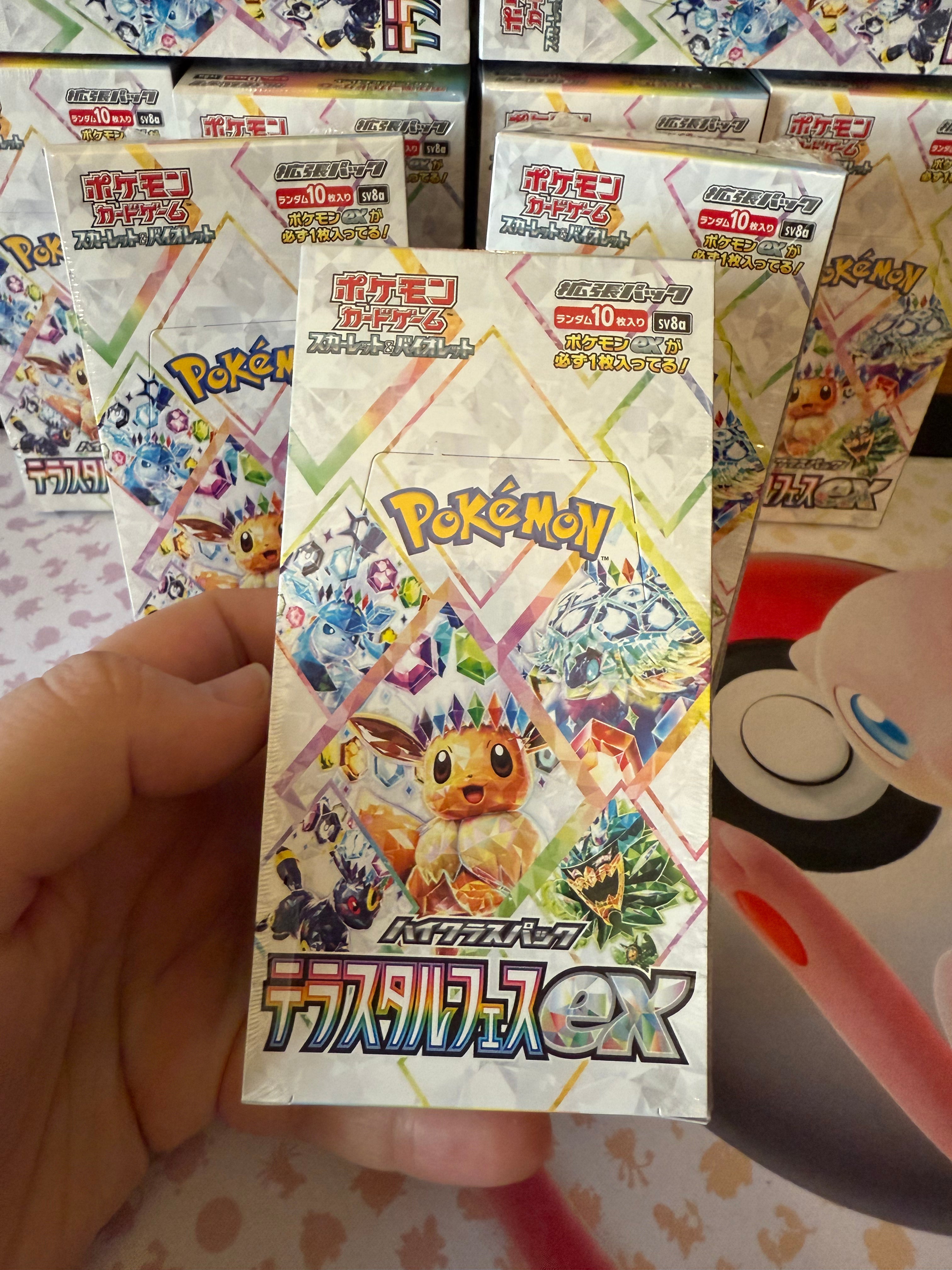 Japanese Pokémon TCG Terastal Festival ex Booster Box, featuring vibrant box art with Pokémon in Terastal forms, adorned with colorful festival-themed elements. Sold by Denji Collectables, an Australian online store specializing in Japanese Pokémon cards.