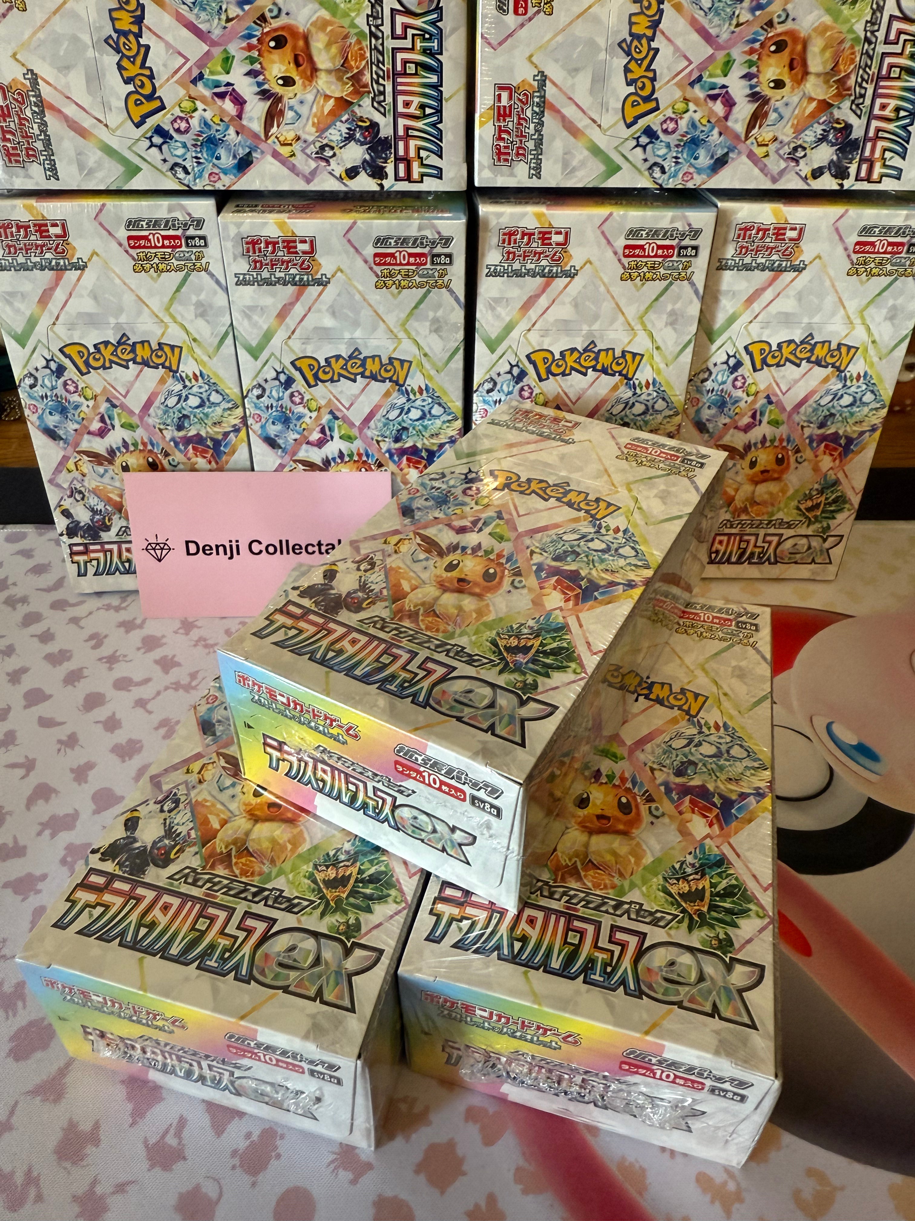 Close-up of a Japanese Pokémon TCG Terastal Festival ex Booster Box showcasing dynamic artwork of Terastalized Pokémon in radiant crystalline forms, with vivid festival-themed designs. Available at Denji Collectables, an Australian online store for Japanese Pokémon cards.”
